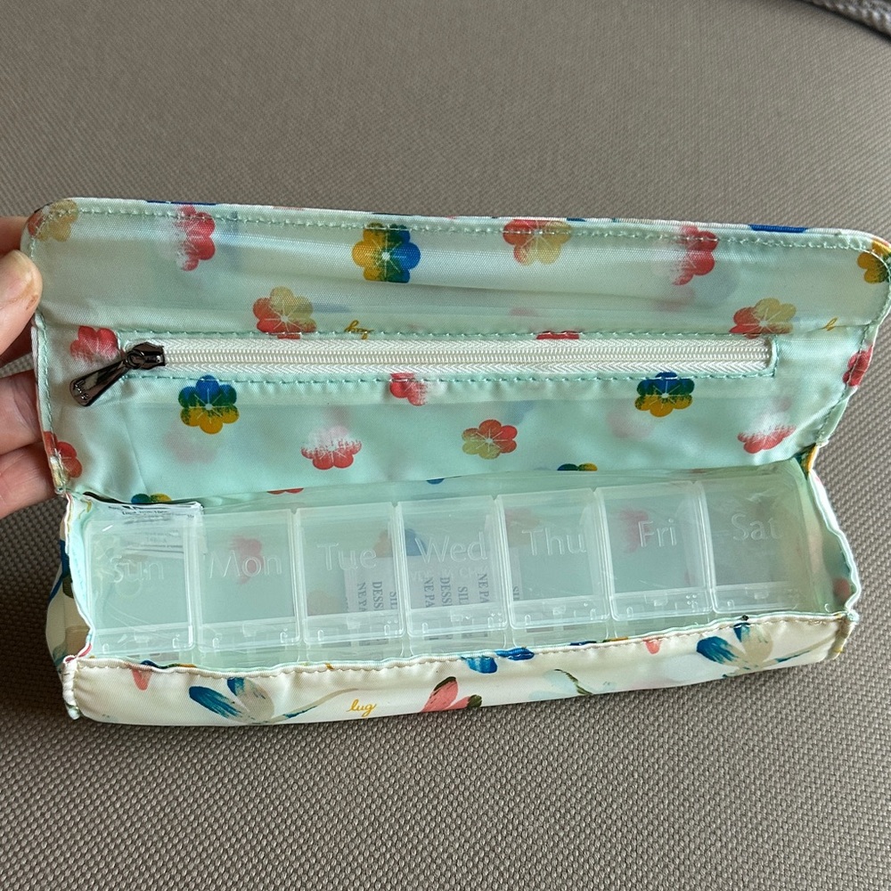 NWOT- Lug Butterfly and Floral Pills Travel Case